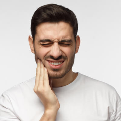 Ouch! What Causes Sensitive Teeth and How to Treat It